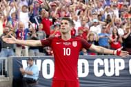 COMMERCE CITY, CO - JUNE 08:  Christian Pulisic #10 of the U.S. National Team celebrates scoring a goal against Trinidad & Tabago in the second half during the FIFA 2018 World Cup Qualifier at Dick's Sporting Goods Park on June 8, 2017 in Commerce City, Colorado.  (Photo by Matthew Stockman/Getty Images)